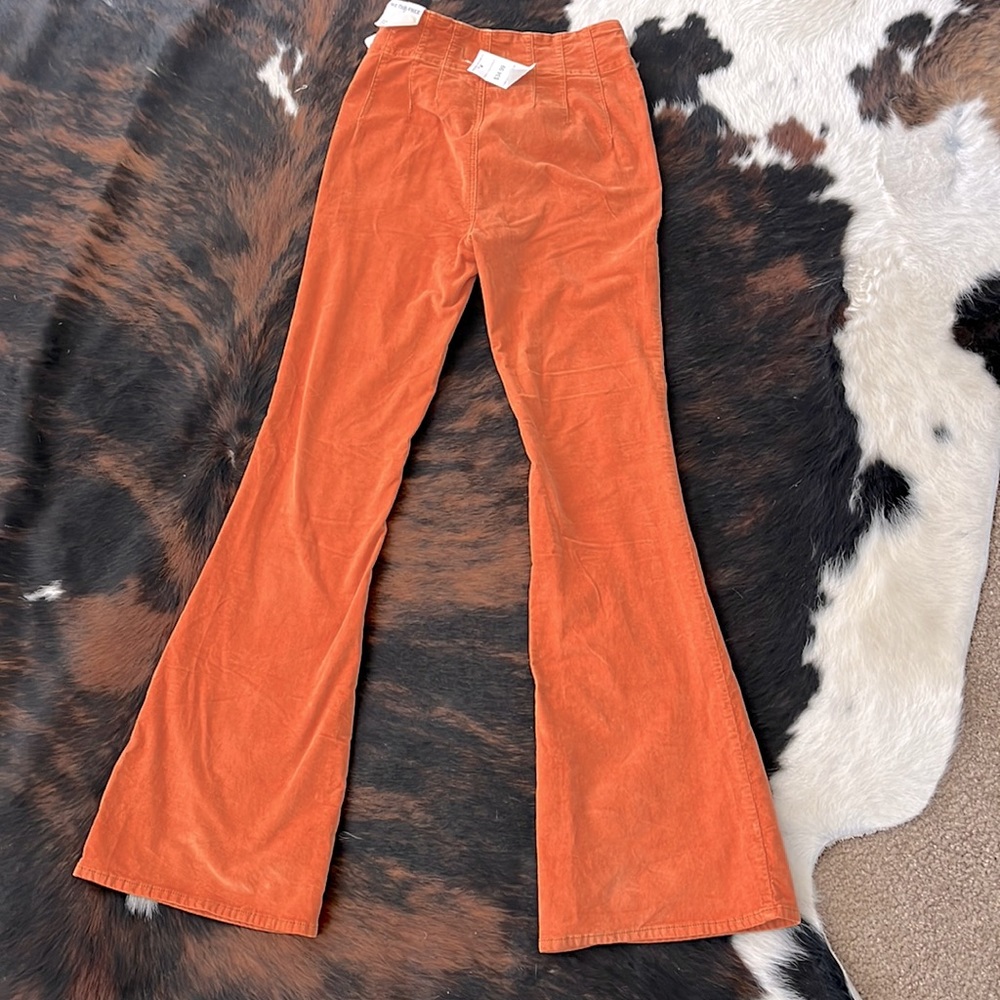 Orange. Flare. Jeans. Fall attire. Suede. Size 26.Tags. Jayde Cord. High rise.
